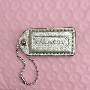 Coach Shimmering Silver Tag Keychain Coach Hangtag Coach bag accessories